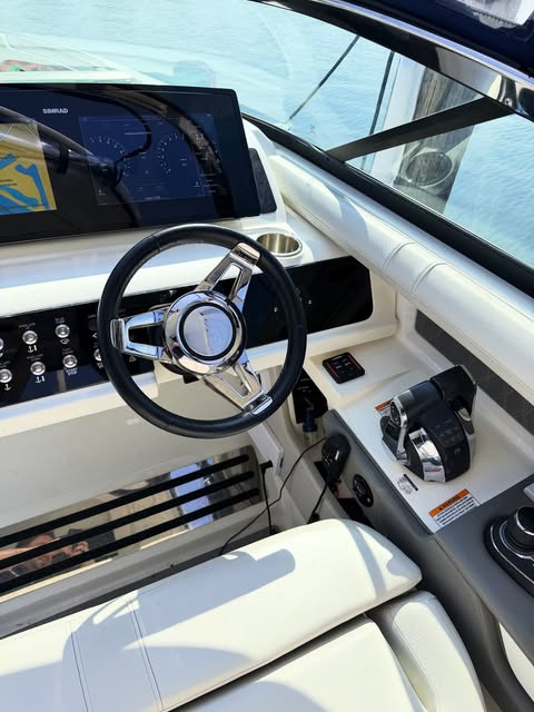 Lenco trim tab switch installed at the helm