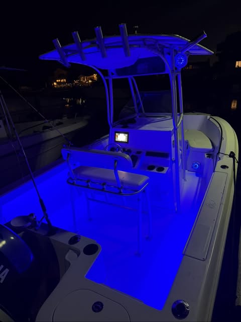 Boat lit with blue RGB lighting at night